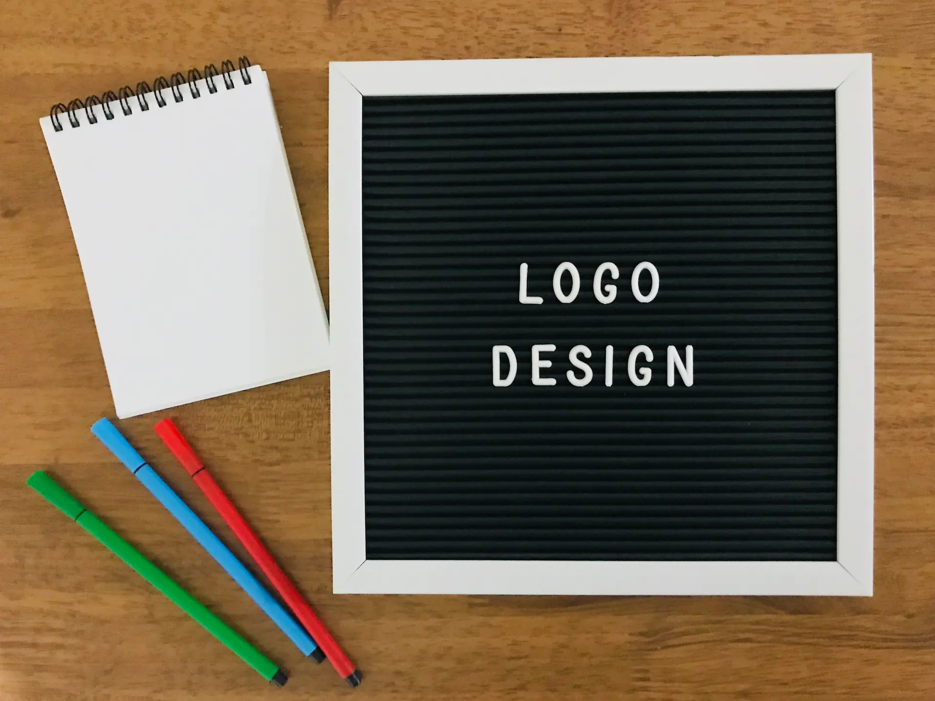 Logo Design on wooden background
